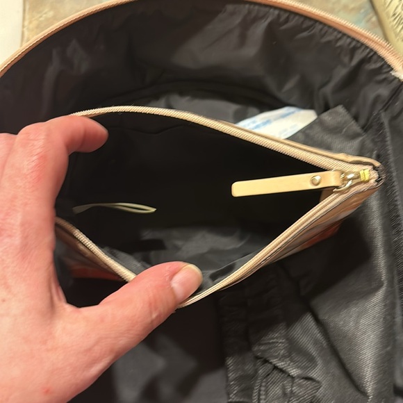 Kate Spade 11” clutch NWT. The only flaw is a small water mark under plastic. - Picture 4 of 16